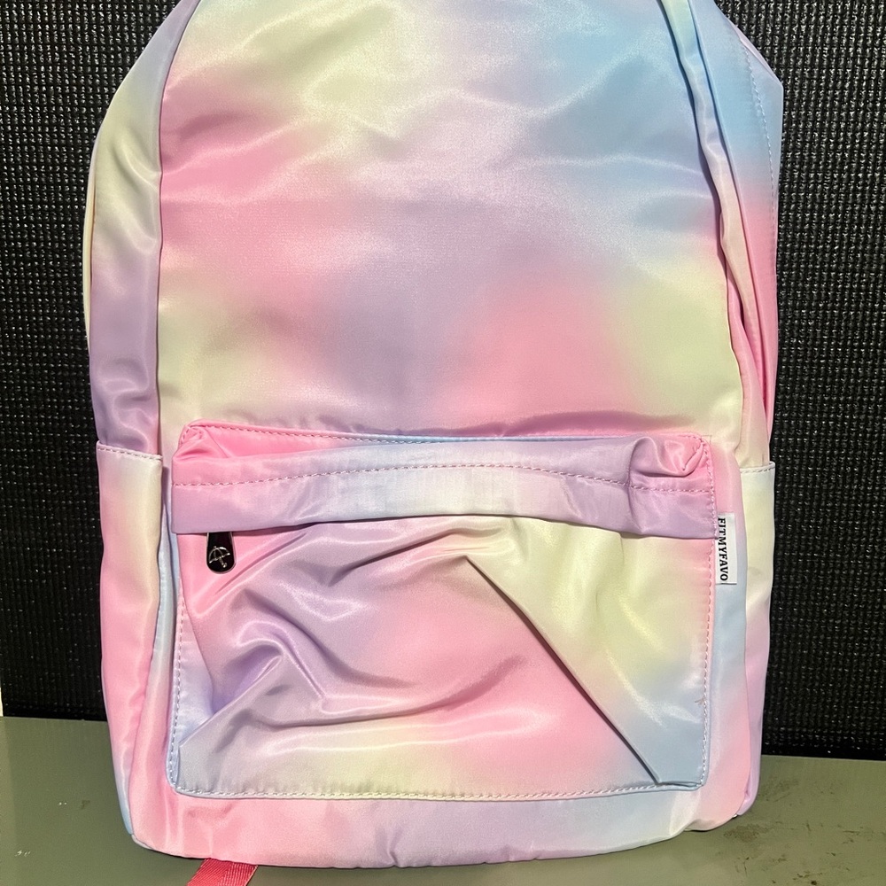 Fitmyfavo backpack with a pastel tie-dye or rainbow print.